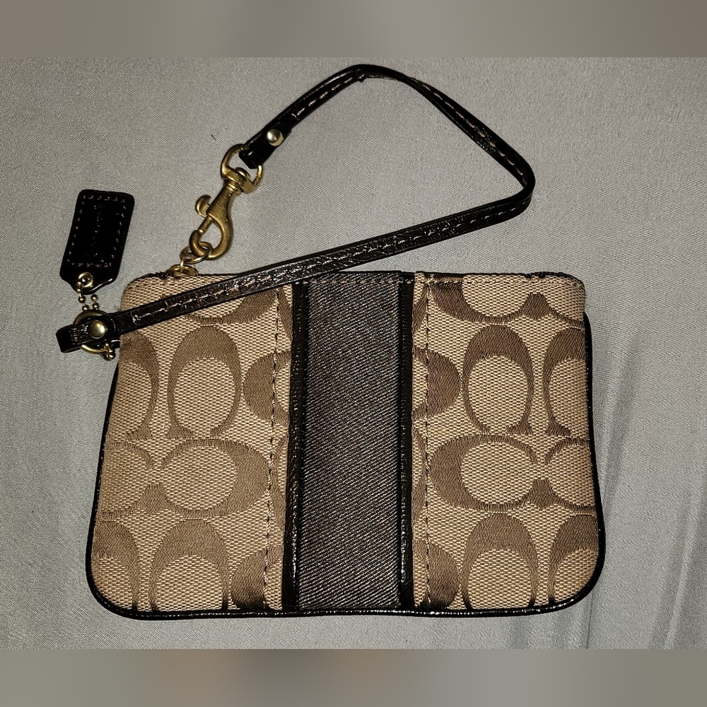 Brown Coach signature wristlet